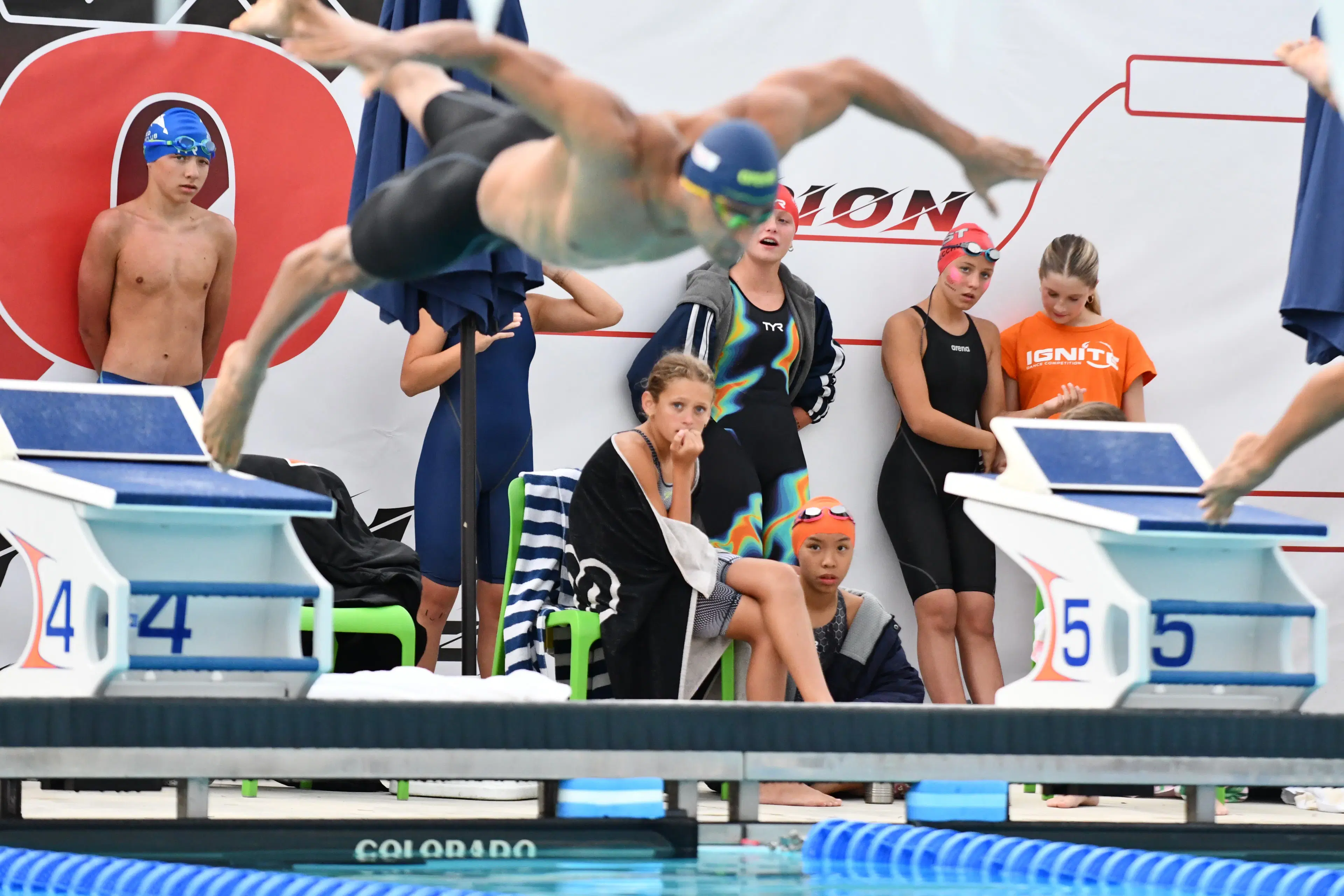 Coach guiding an athlete through a training session