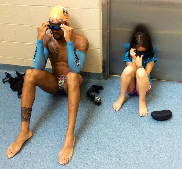 Athlete and child practicing with blackout goggles